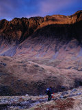 Hiker Descending to Glencoe  Scotland