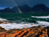 Rainbow Dipping into Coles Bay During Stormy Weather  Freycinet National Park  Tasmania  Australia