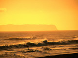 A Couple Frolicking in the Surf off Kekaha Beach with Niihau Island in the Distance  Kauai  Hawaii