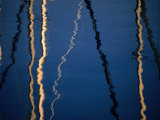 Reflection of Sailboat Masts in Lake Maggiore  Locarno  Switzerland