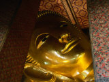 Face of Largest Reclining Buddha in Thailand  Wat Pho  Bangkok  Thailand