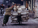 Man Transporting Locally Made Ceramic Pots by Bicycle  Hanoi  Vietnam