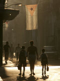 A Mother Walks Her Children to School in Old Havana  Cuba