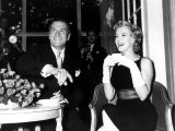 Marilyn Monroe Drinking a Cup of Tea as She Sits with Laurence Olivier Smoking a Cigarette  1956