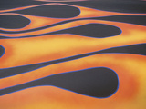 Flame Decoration on Side of Black Car
