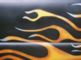 Flame Decoration on Side of Black Car