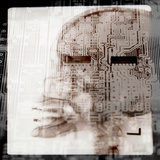 Computer Circuitry Superimposed on X-Ray of Person's Skull