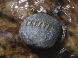Create Written on Rock in Flowing Water