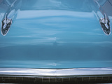 Chrome Decorations on Front of Blue Car