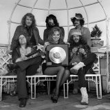 Julie Ege Presents a Gold Record to Jethro Tull for Selling a Million Dollars Worth of Sales