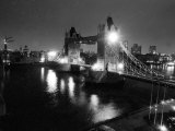 A View of Tower Bridge on the River Thames Illuminated at Night in London  April 1987