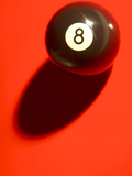 Black and White Eight Ball on with Shadow on Red Background