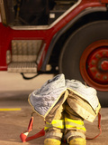 Firefighting Gear with Truck in Background