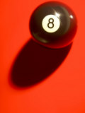 Eight Ball on with Shadow on Red Billard Table