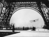 French Aviator Lieutenant Collot Successfully Flies His Biplane Beneath the Tour Eiffel