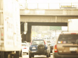 Cars and Semis Driving Along Highway
