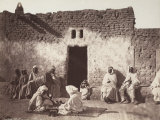 Group of People in Front of a Cafe of Biskra