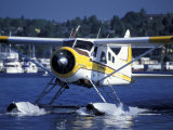 Float Plane Taxiing to Terminal on Lake Union  Washington  USA