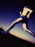 Low Angle View of a Young Woman Running