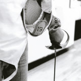 Person Holding a Fencing Sword