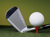 Golf Club and Ball on Tee
