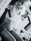 Young Woman Working Out in a Health Club