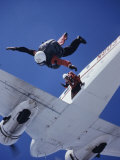 Skydivers Jumping from Plane