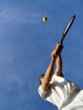 Tennis Player with Blue Sky