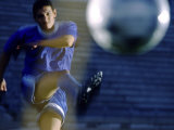 Soccer Player Kicking a Soccer Ball
