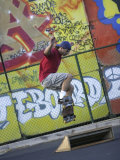 Skateboarder with Graffiti Background