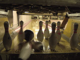 Rear View of Pins Being Struck by a Bowling Ball