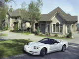 Home with a Sports Car Parked in Front