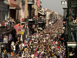 Revelers Pack the French Quarter's Famous Bourbon Street During the Annual Mardi Gras Celebration