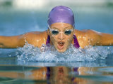 Close-up of a Young Woman Swimming the Butterfly Stroke