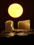 The Full Moon Rises Behind the Ancient Temple of Posseidon