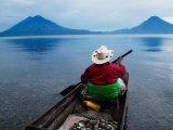 Man on Canoe in Lake Atitlan  Volcanoes of Toliman and San Pedro Pana Behind  Guatemala
