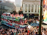 Mardi Gras Revellers Greet a Float from the Zulu Parade
