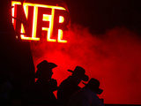 Stockmen Watch the Opening Ceremonies of the National Finals Rodeo