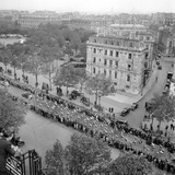 Contestants in the 1948 Tour De France Parade up the Champs Elysees