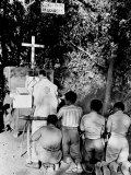 A Catholic Priest Celebrates Mass at the Open Air Chapel of Lourdes