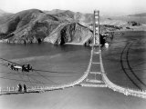 Workers Complete the Catwalks for the Golden Gate Bridge