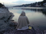 A Hindu Pilgrim Meditates Along the Bank of the Ganges River