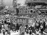 A Crowed Gathers as Floats Make Their Way Through Canal Street During the Mardi Gras Celebration