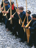 Miao Men Playing Traditional Bamboo Musical Instrument  China
