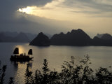 Sunset on Karst Hills and Junk Boats  Ha Long Bay  Vietnam