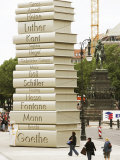 Visitors Look at a Sculpture Erected by the Initiative 