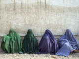 Women Wearing Burquas Wait to be Received at a Clinic