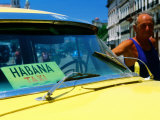 Man with 1950's Taxi  Havana  Cuba