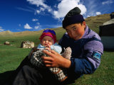 Boy and Baby in Front of Yurt Camp  Kyrgyzstan
