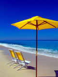 Yellow Chairs and Umbrella on Pristine Beach  Caribbean